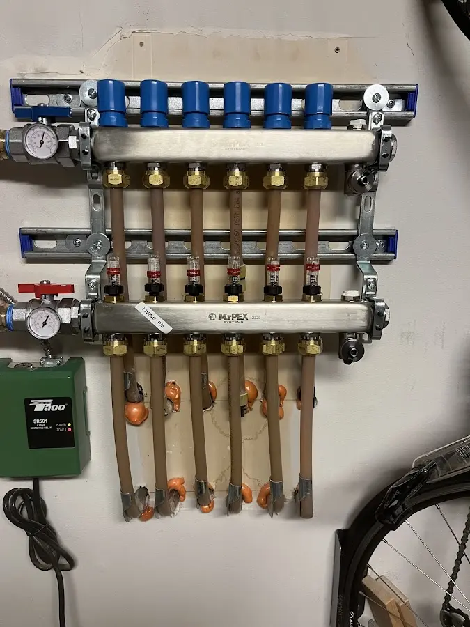 Plumber performing Gas Line Installation at a residential property in Summit Hill